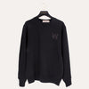 Soft sweatshirt with crew neckline with bedazzled W embellished on the front 