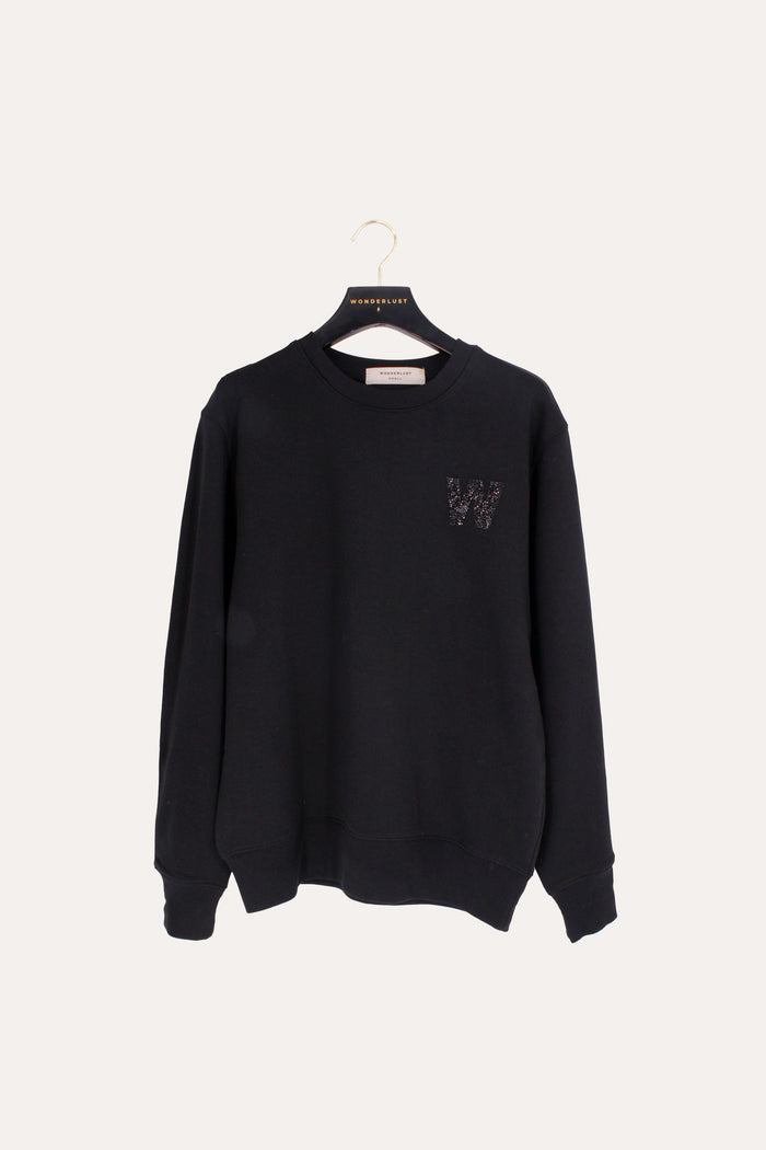 Soft sweatshirt with crew neckline with bedazzled W embellished on the front 
