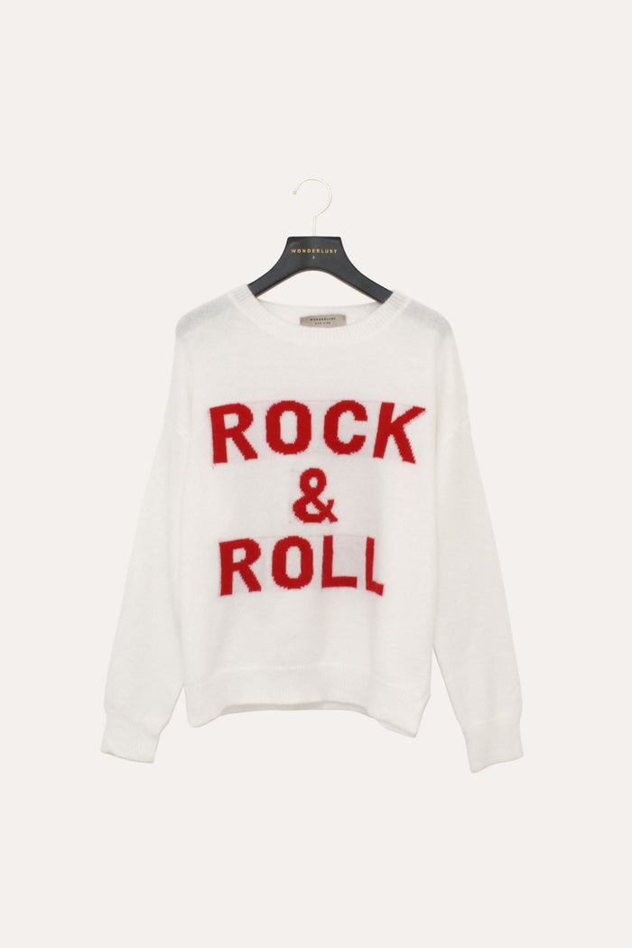 knitted white jumper with rock and roll lettering